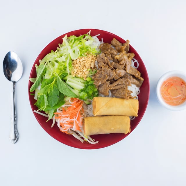 68. Grilled Pork & Egg Roll on Vermicelli.